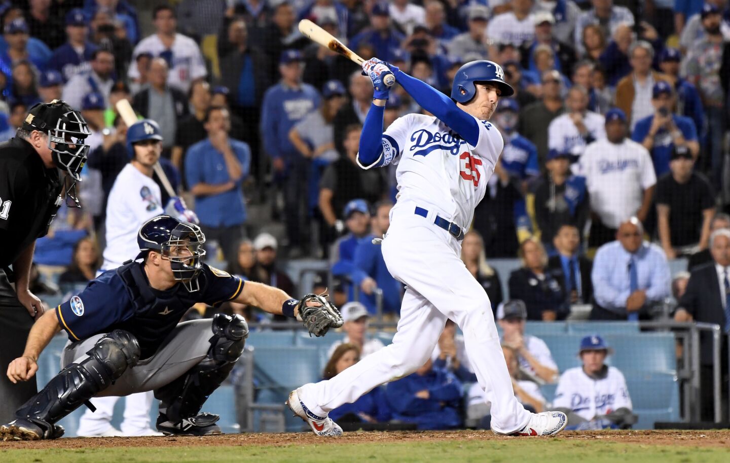 Dodgers Cody Bellinger hits the game-winning RBI against the Brewers in the 13th inning.