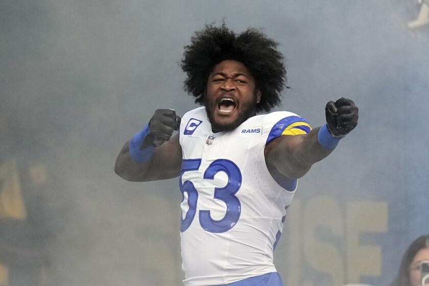  Rams linebacker Ernest Jones (53) gestures during team introductions.