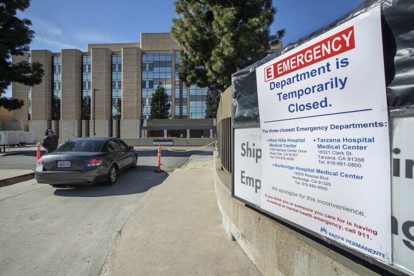 A sign alerts people arriving at the Kaiser Permanente Woodland Hills Medical Center that the emergency department is temporarily closed. In addition to the emergency department closure, the urgent care services, hospital and outpatient services at the medical center are also temporarily closed because of a water line failure.