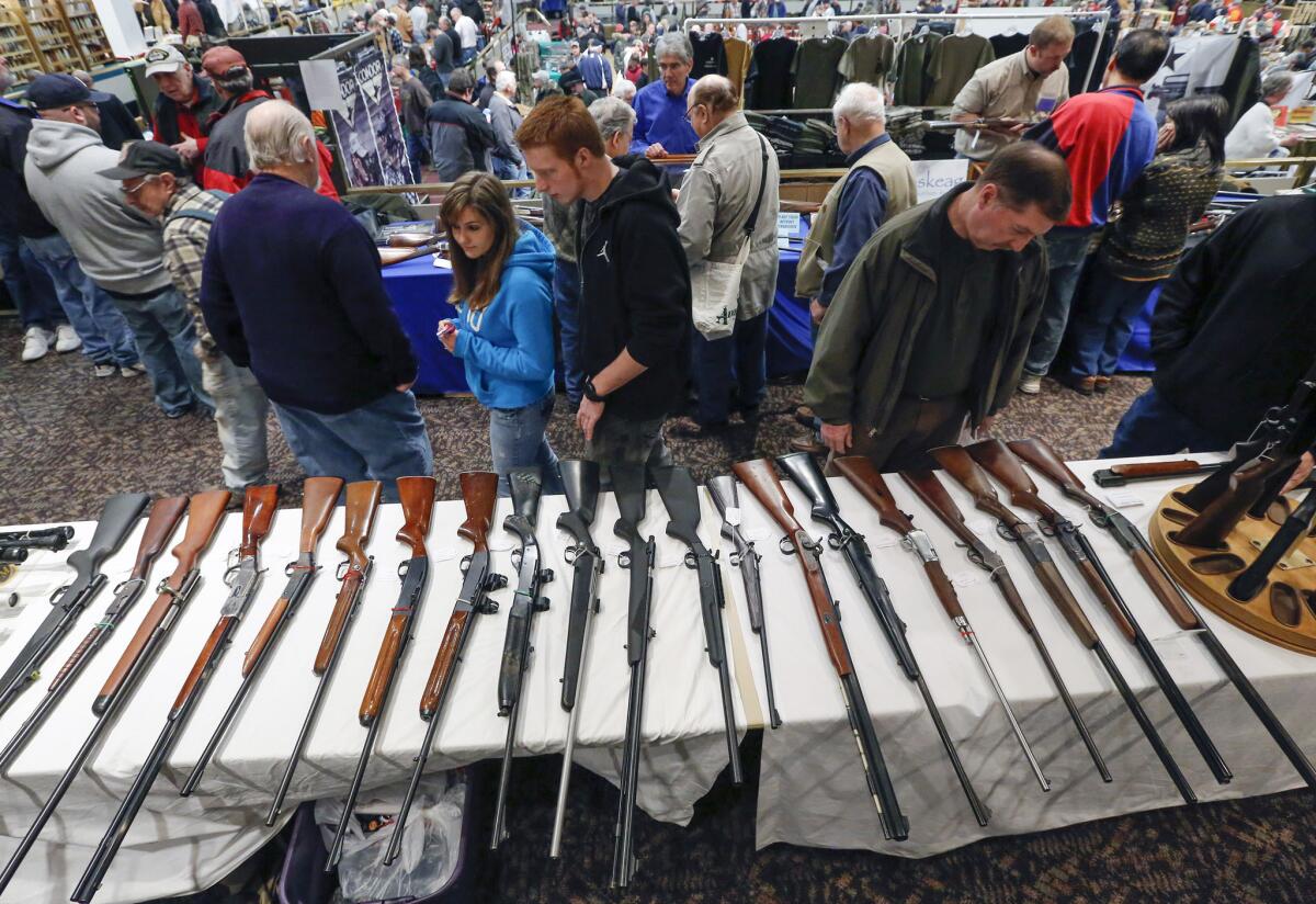 Guns are displayed during a show at the Empire State Plaza Convention Center in Albany, N.Y.