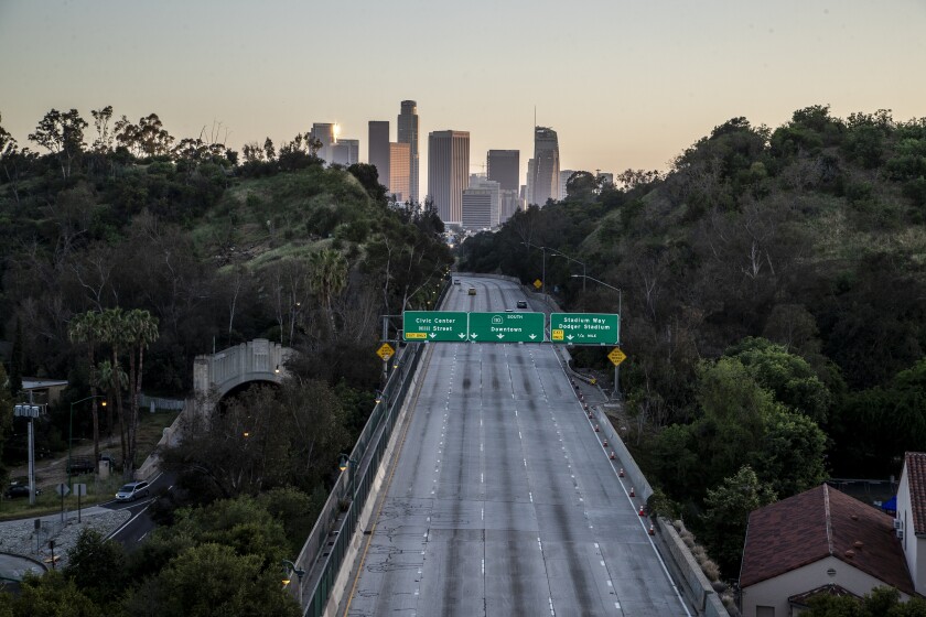 The practically deserted southbound 110 freeway during the early days of the pandemic.