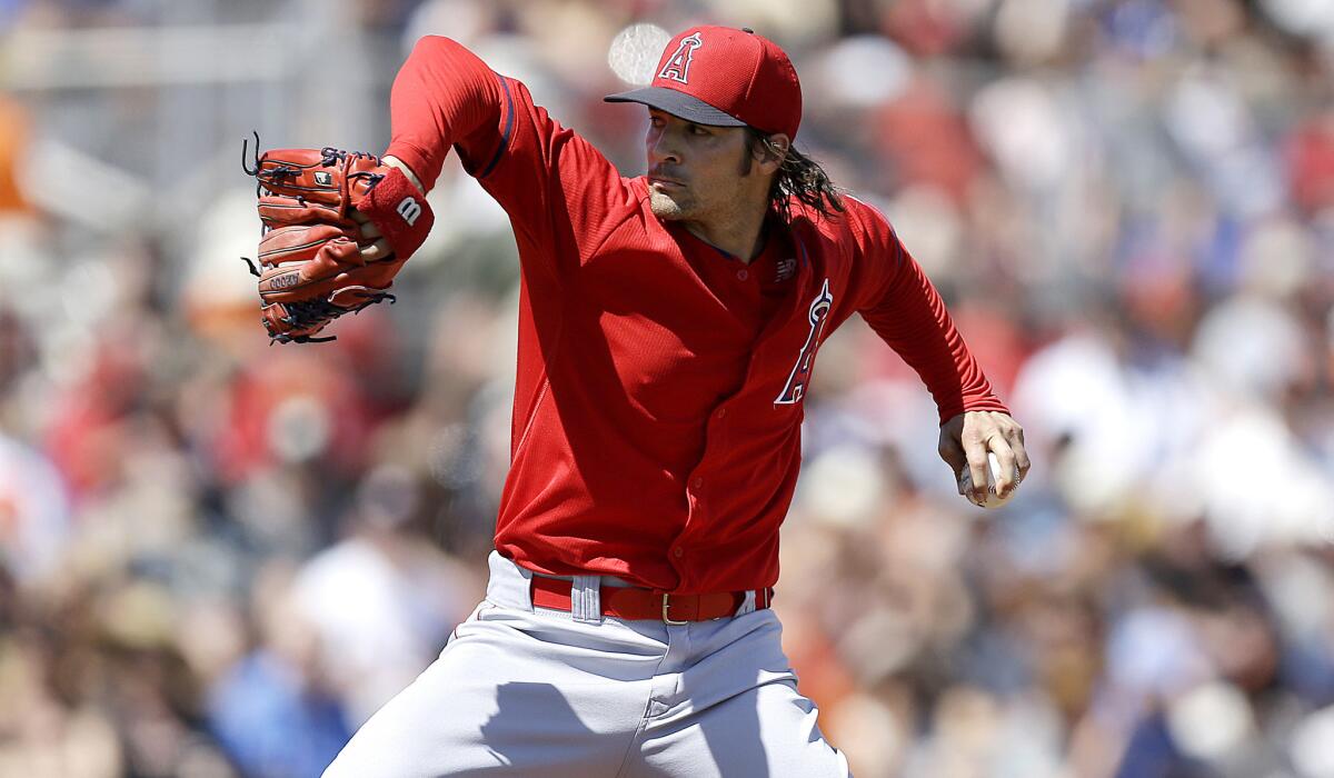 Angels starting pitcher C.J. Wilson pitched 4 1/3 innings on Sunday against the Giants.