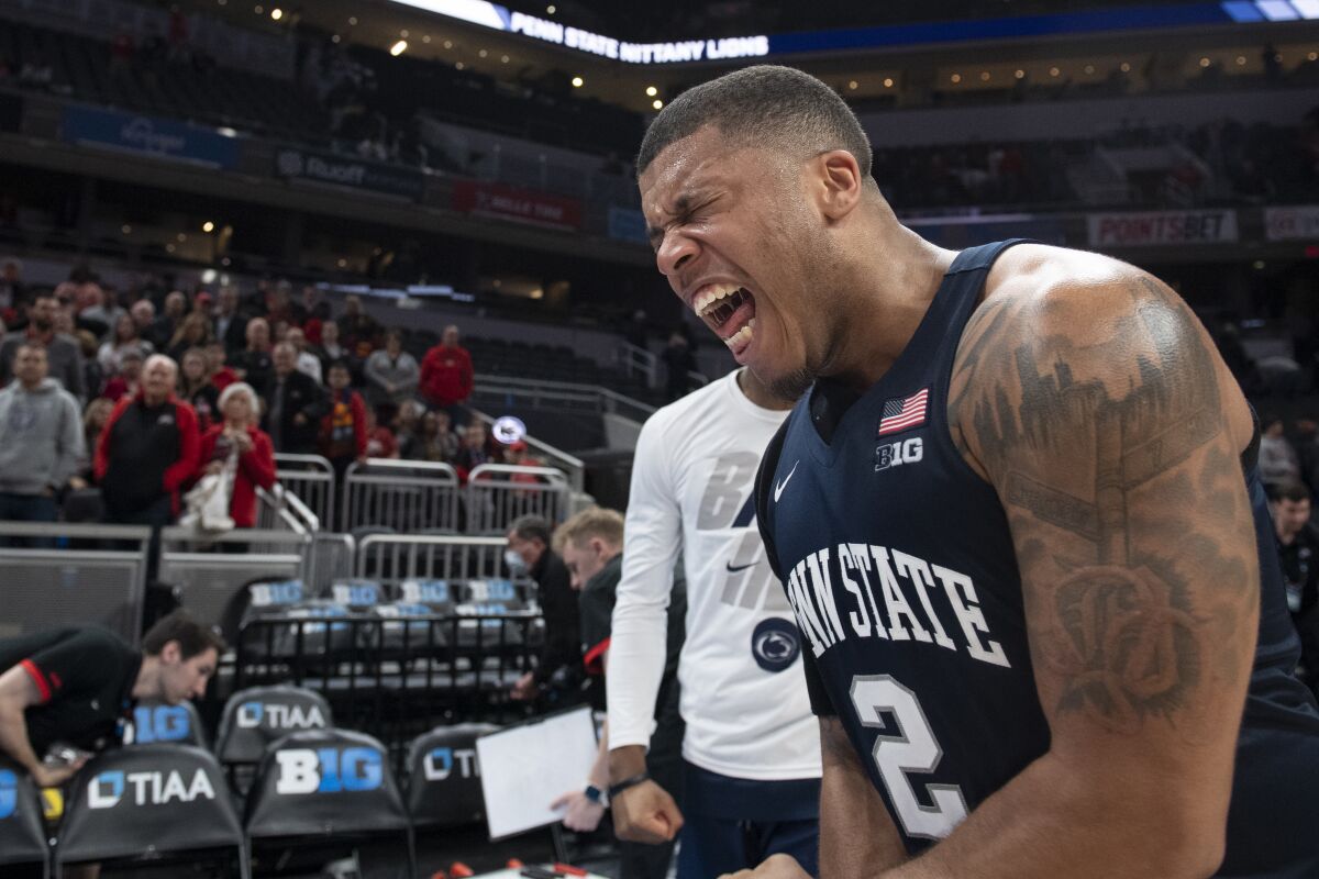 Penn State guard Myles Dread (2) celebrates after an NCAA college basketball game against Ohio State in the Big Ten Conference tournament Thursday, March 10, 2022, in Indianapolis. (Noah Riffe/Centre Daily Times via AP)