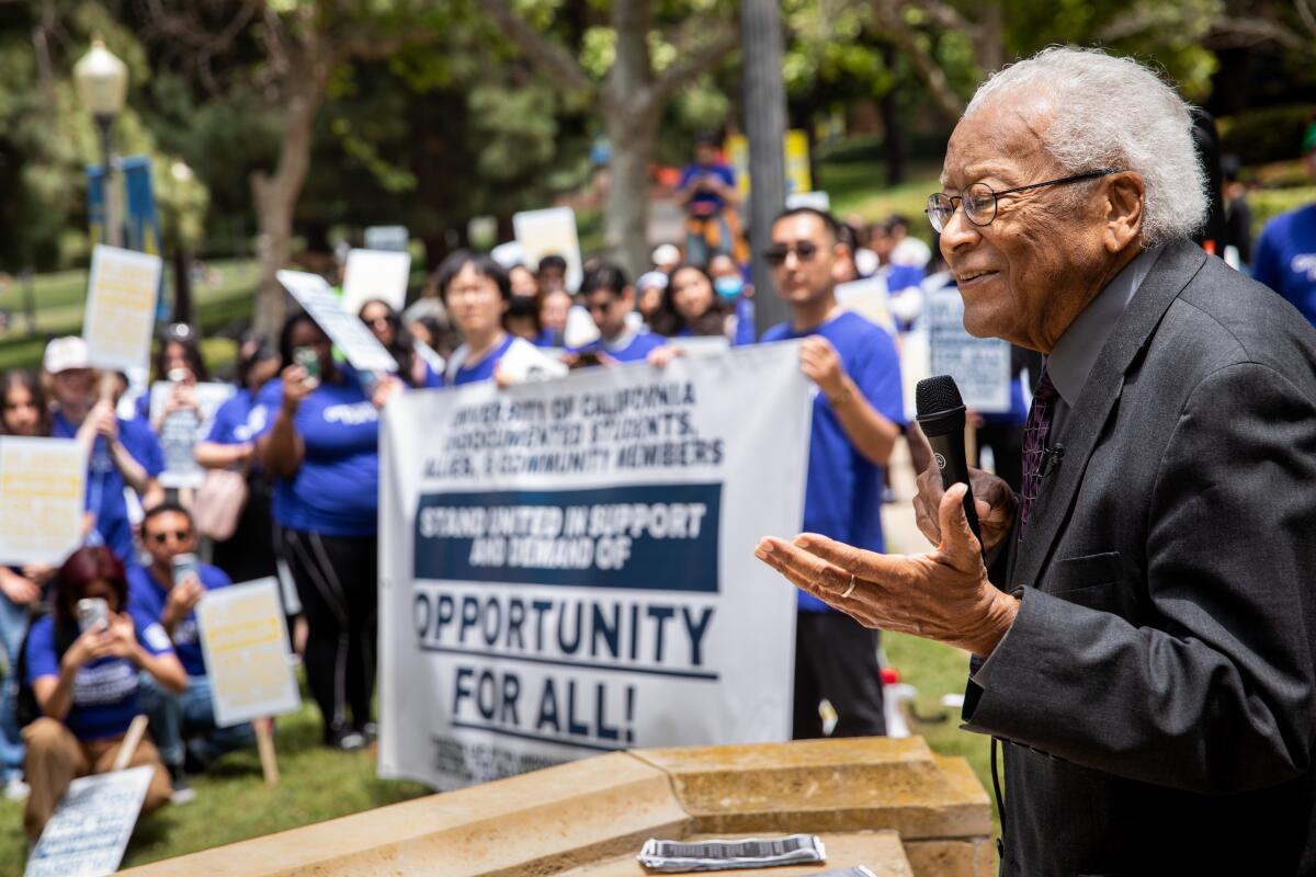Los Angeles, CA - May 17: Civil Rights icon Rev. James Lawson speals at a rally before students and supporters gathered to support undocumented students in the University of California system, rallying and marching to protest outside a meeting of the UC Board of Regents meeting, on the UCLA Campus in Los Angeles, CA, Wednesday, May 17, 2023. The rally wants to demand the UC Board of Regents break legal ground and authorize the hiring of students who were brought to this country illegally as children and lack valid work permits. (Jay L. Clendenin / Los Angeles Times)