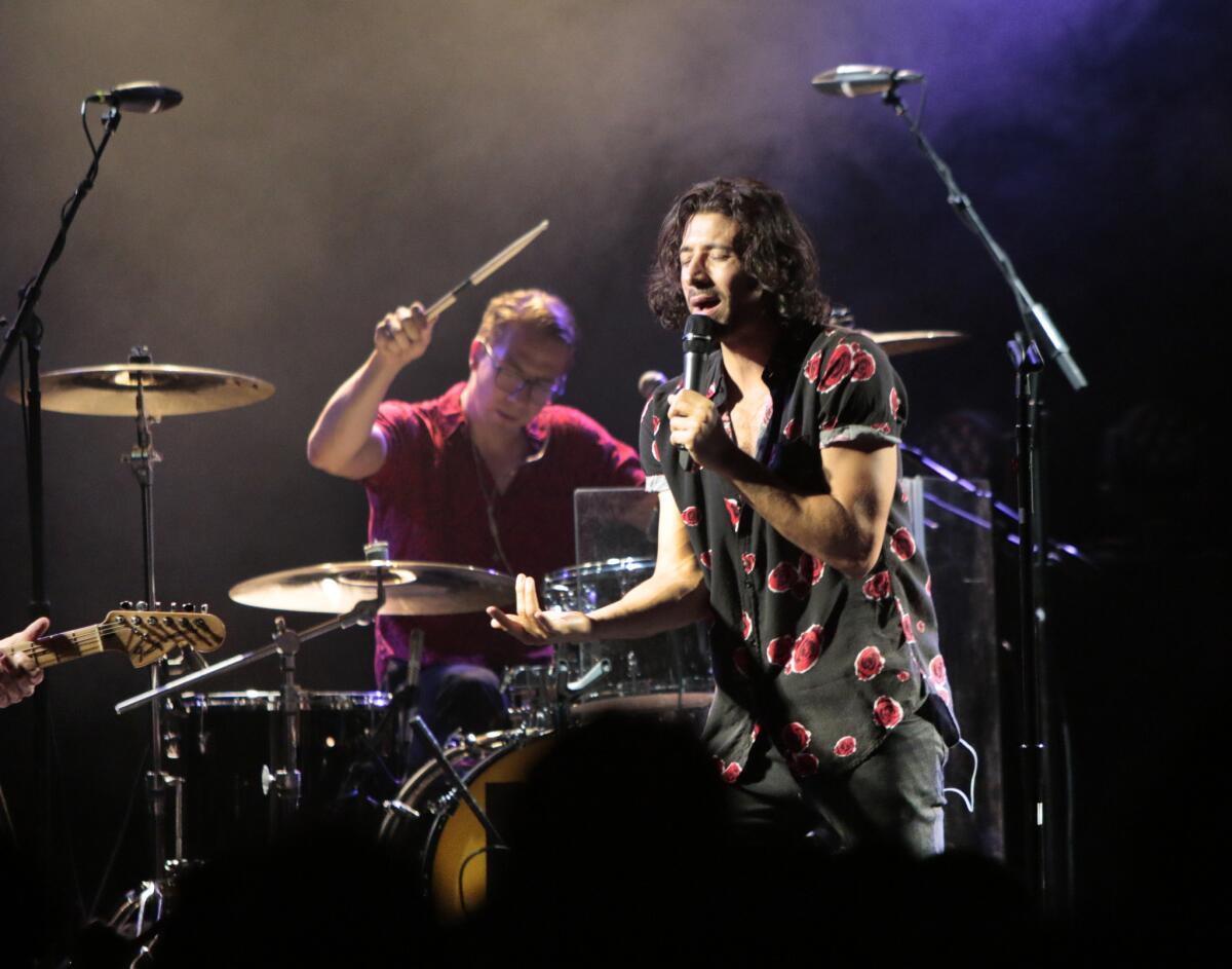 Nasri Atweh, lead vocals, and Alex Tanas, drums, of Magic! perform at the El Rey Theatre in Los Angeles on July 01, 2014.