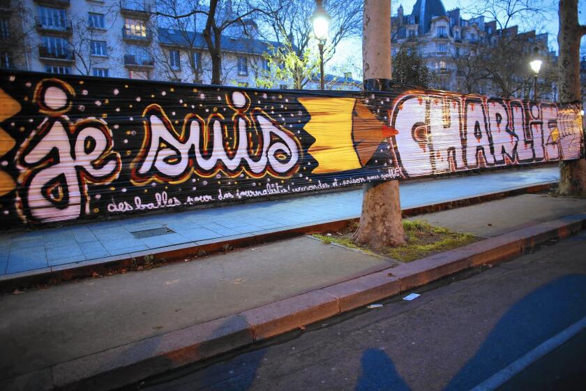 An "I am Charlie" banner hangs near the offices of the French satirical magazine Charlie Hebdo in Paris after the attacks last week.