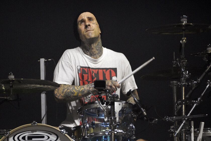 FILE - Travis Barker of Blink-182 performs during the band's private concert on June 20, 2019, in Los Angeles. Barker turns 46 on Nov. 14. (Photo by Chris Pizzello/Invision/AP, File)