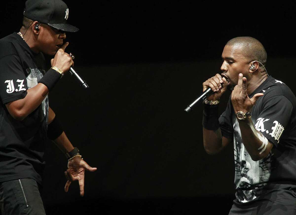 Jay-Z, left, and Kanye West.