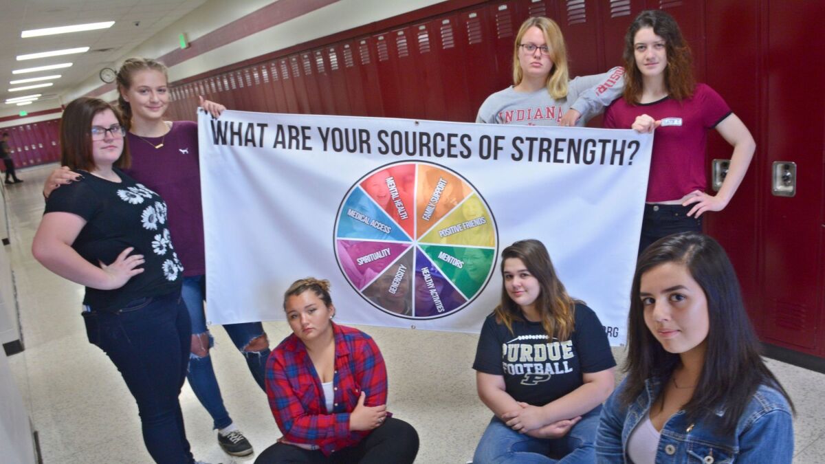 Student members of the Sources of Strength suicide prevention awareness program at Logansport High School in Logansport, Ind., in May.