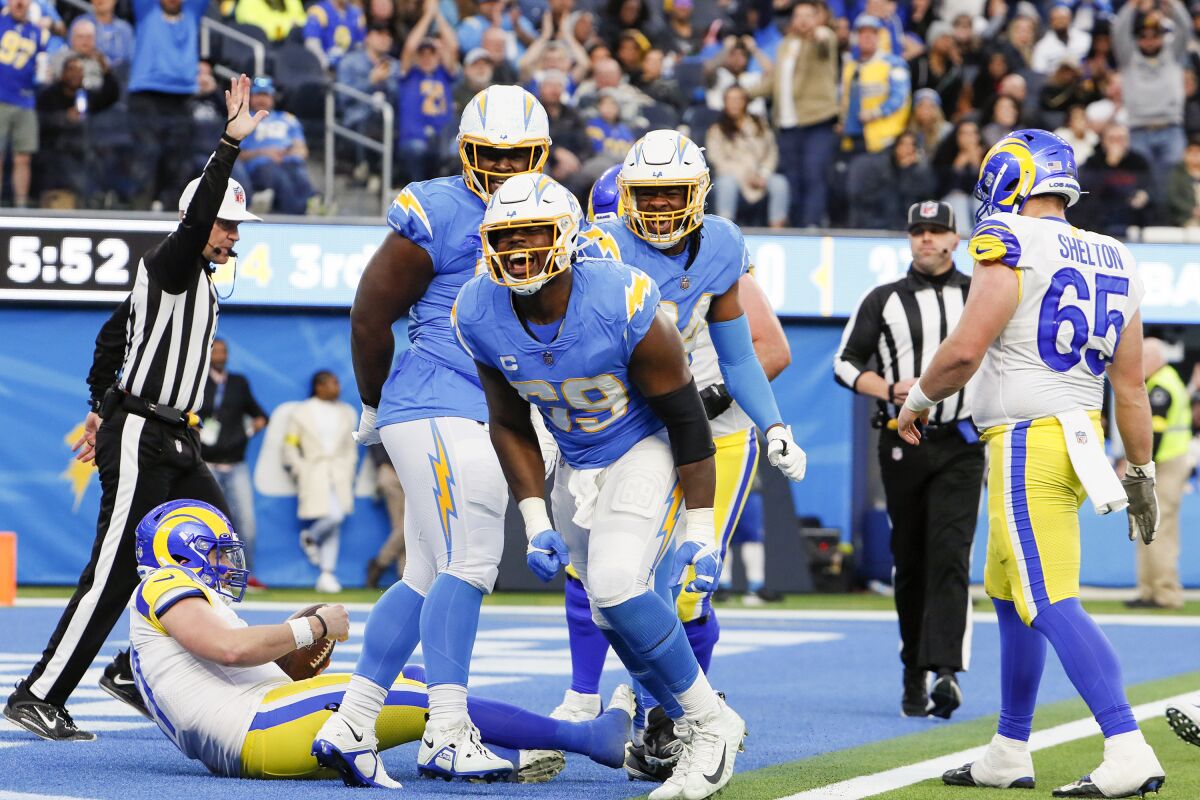 Chargers defensive tackle Sebastian Joseph-Day (69) celebrates after sacking the Rams' Baker Mayfield (17).