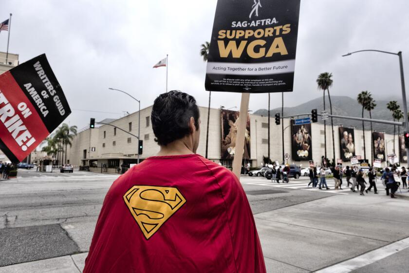 Actor Jeff Torres joins picketers outside Warner Bros. Studios during a Writers Guild rally on Wednesday, May 24, 2023, in Burbank, Calif. (AP Photo/Richard Vogel)