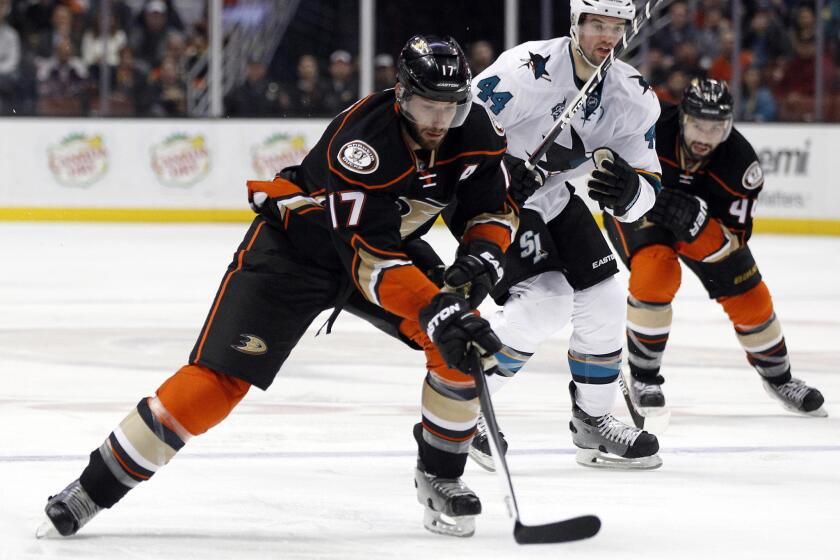 Ducks forward Ryan Kesler takes the puck up ice on a breakaway against Sharks defenseman Marc-Edouard Vlasic during the second period of a game on Feb. 2.