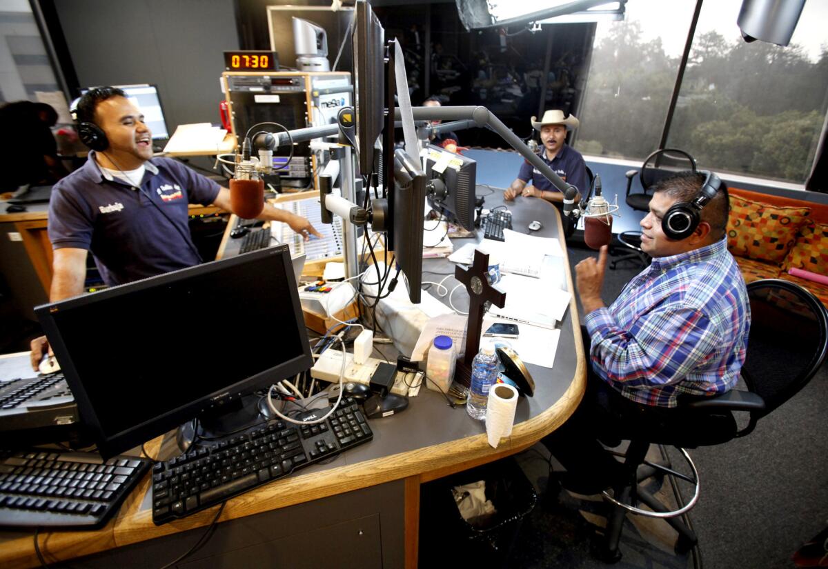 Ricardo "El Mandril" Sanchez, right, has supplanted Spanish-language radio celebrity Eddie "Piolin" Sotelo in some markets.