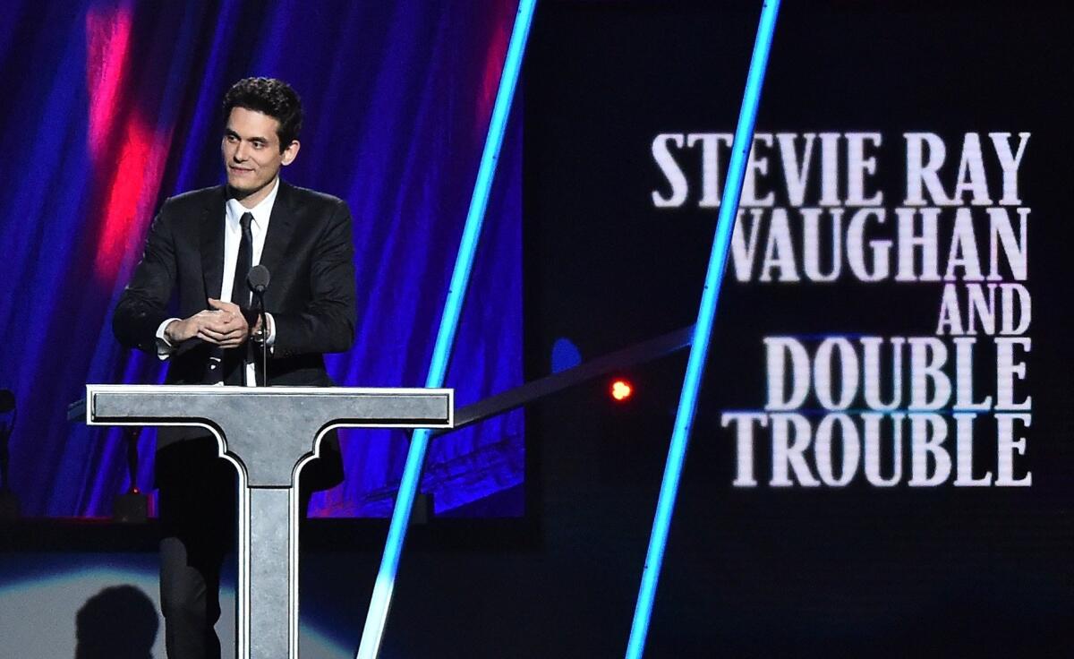 John Mayer speaks during the induction of Stevie Ray Vaughan and his band, Double Trouble, at the 30th Rock and Roll Hall of Fame Induction in Cleveland.