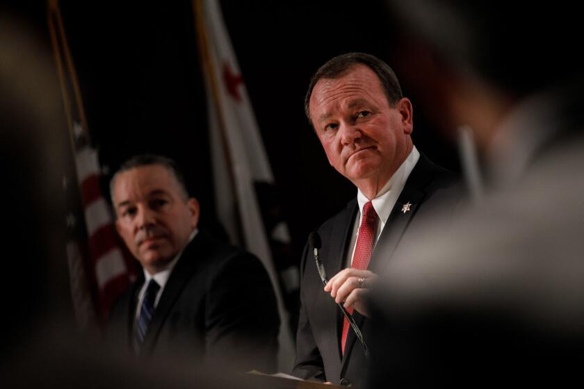 LOS ANGELES, CALIF. -- MONDAY, JULY 23, 2018: L.A. County Sheriff Jim McDonnell debates retired Sheriff's Lt. Alex Villanueva at an event hosted by the Professional Peace Officers Association, in Los Angeles, Calif., on July 23, 2018. (Marcus Yam / Los Angeles Times)