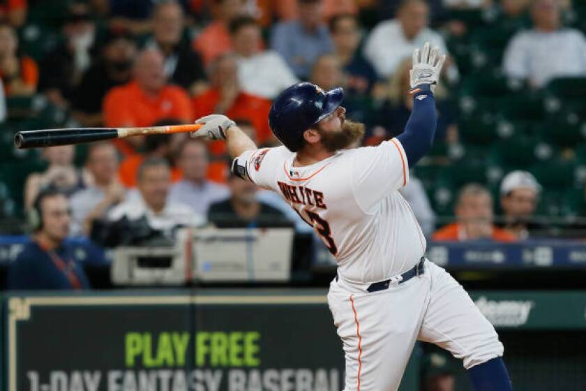 HOUSTON, TX - AUGUST 29: Tyler White #13 of the Houston Astros hits a walk-off home run in the ninth inning to beat the Oakland Athletics 5-4 at Minute Maid Park on August 29, 2018 in Houston, Texas. (Photo by Bob Levey/Getty Images)
