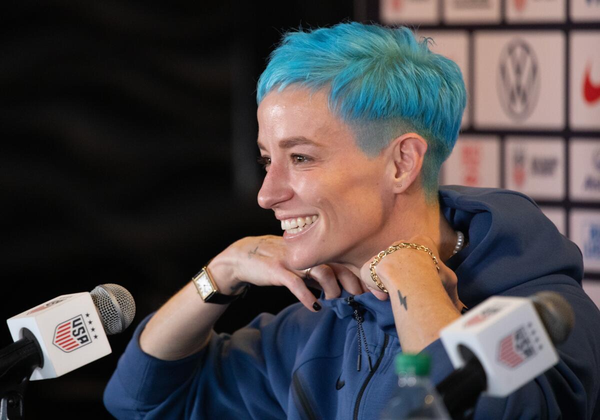 U.S. soccer star Megan Rapinoe addresses the media during a news conference in June.