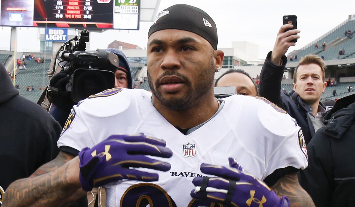 Baltimore receiver Steve Smith walks off the field after his final NFL game on Jan. 1 in Cincinnati.