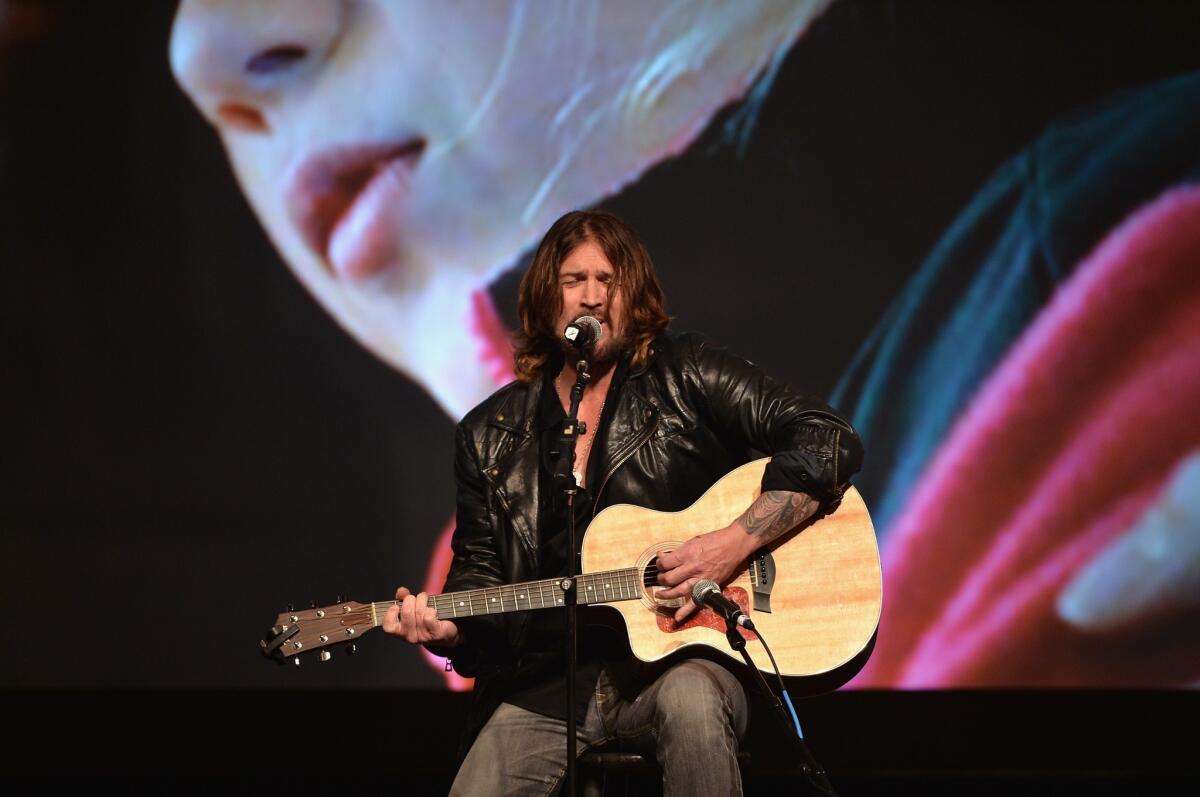 Billy Ray Cyrus, at the Movieguide Awards Gala in Universal City on Feb. 7, has put a rap spin on his hit "Achy Breaky Heart."