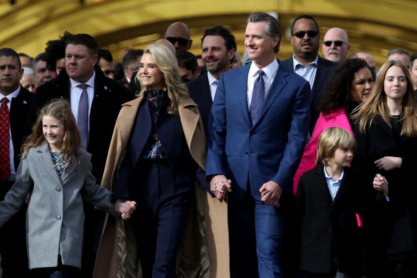 SACRAMENTO, CA - JANUARY 06: Governor Gavin Newsom in People's March on Tower Bridge during inauguration ceremony for a second term in downtown on Friday, Jan. 6, 2023 in Sacramento, CA. (Gary Coronado / Los Angeles Times)
