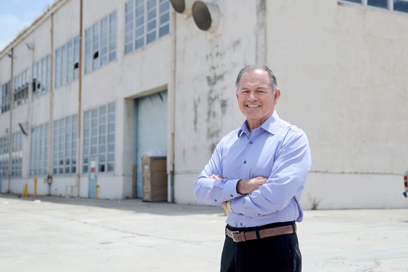 Retired Marine Corps Brig. Gen. Michael Aguilar in front of a WWII hangar at Orange County Great Park in Irvine.