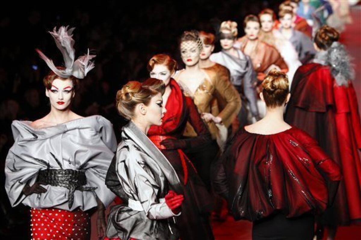 Models wear creations of British fashion designer John Galliano for Dior's Haute Couture Spring Summer 2011 fashion collection presented in Paris, Monday, Jan. 24, 2011. (AP Photo/ Francois Mori)