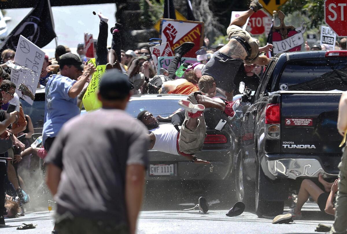 James Alex Fields Jr. is accused of driving his Dodge Charger into a crowd of protesters in Charlottesville, Va., killing one woman.