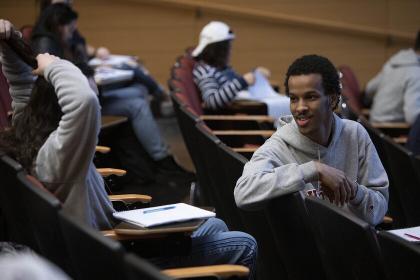 UC Berkeley student Ahmad Mahmuod turns to another student in his philosophy class. 