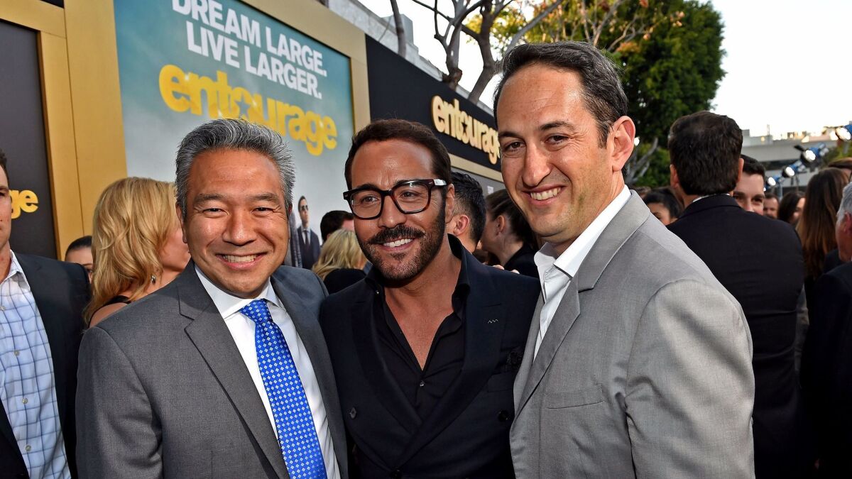 From left, Warner Bros. Chief Executive Kevin Tsujihara, actor Jeremy Piven and Warner Bros. Pictures President of Creative Development and Worldwide Production Greg Silverman appear at the premiere of "Entourage."