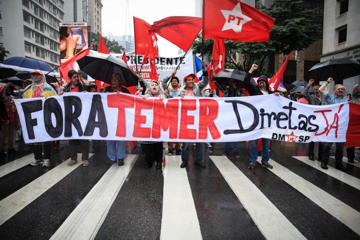 Thousands demonstrate on the Avenida Paulista in Sao Paulo, Brazil, on May 21, 2017. Protesters are demanding the resignation of Brazilian President Michel Temer mired in a corruption scandal in which he is accused of receiving millions of U.S. dollars in illicit payments and sought to obstruct an investigation.