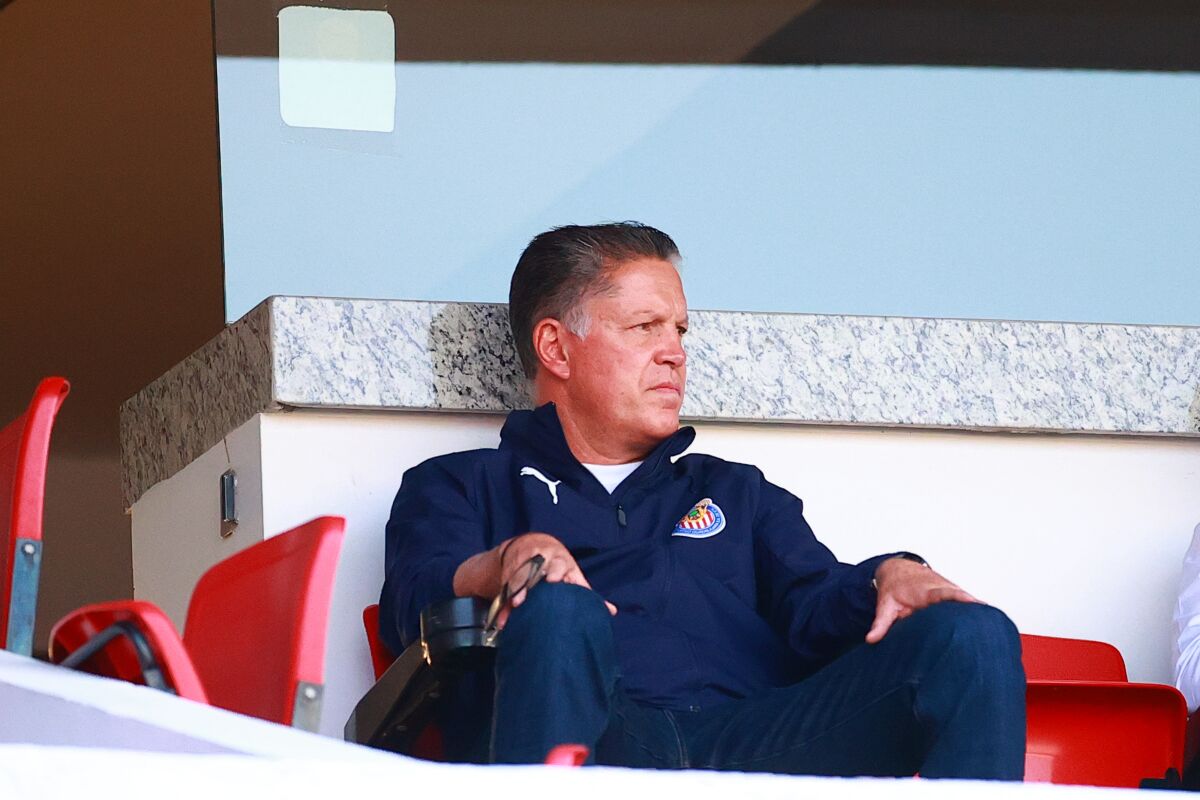 Ricardo Peláez, Chivas' director of football operations, watches a match against Queretaro.