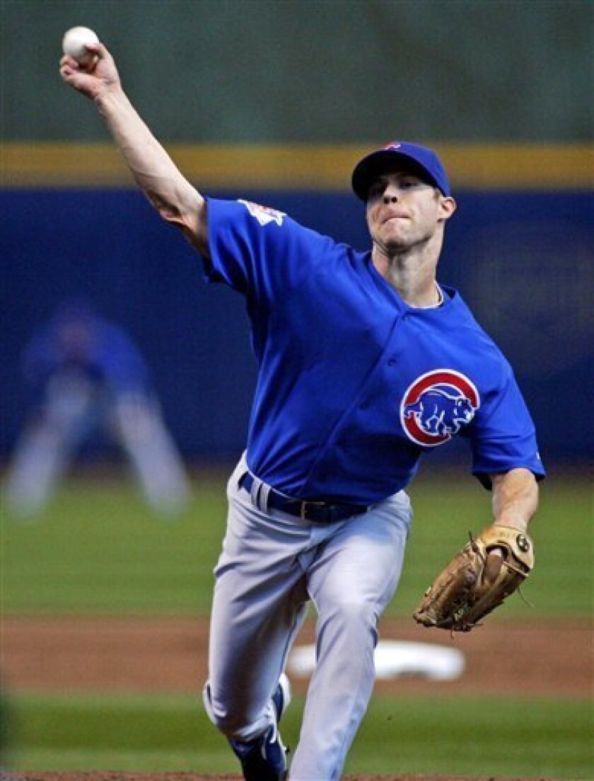 Chicago Cubs' Rich Harden, pitches to the Milwaukee Brewers in the first inning of a baseball game Friday, April 10, 2009, in Milwaukee. (AP Photo/Darren Hauck)