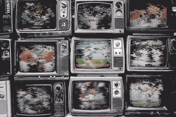 A photo illustration of broken TVs showing fuzzy baseball games