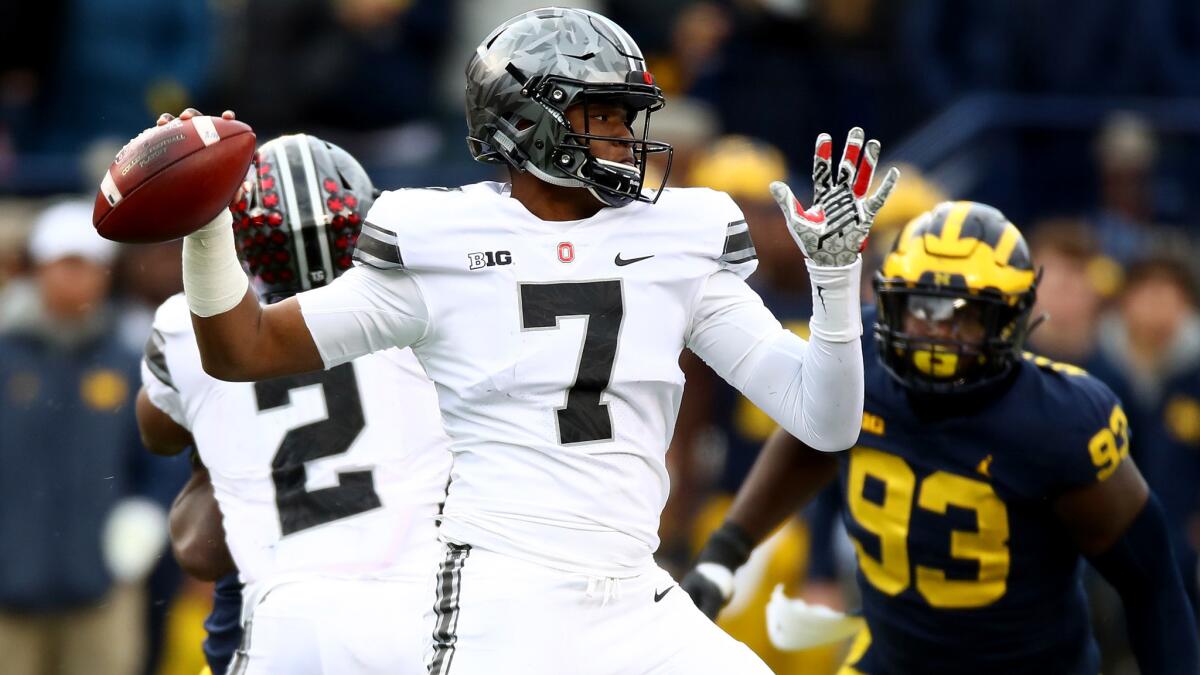 Ohio State backup QB Dwayne Haskins attempts a pass during the second half against Michigan on Saturday.