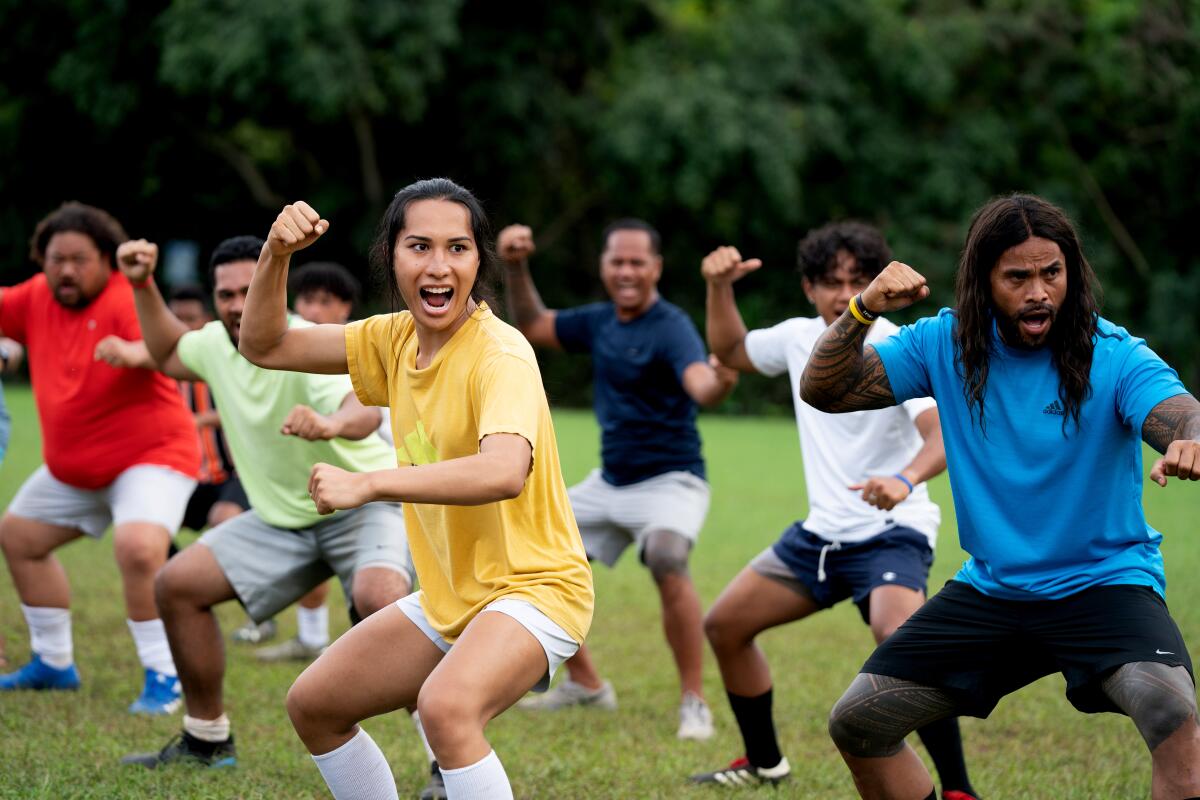 A soccer team gets stoked for a game.