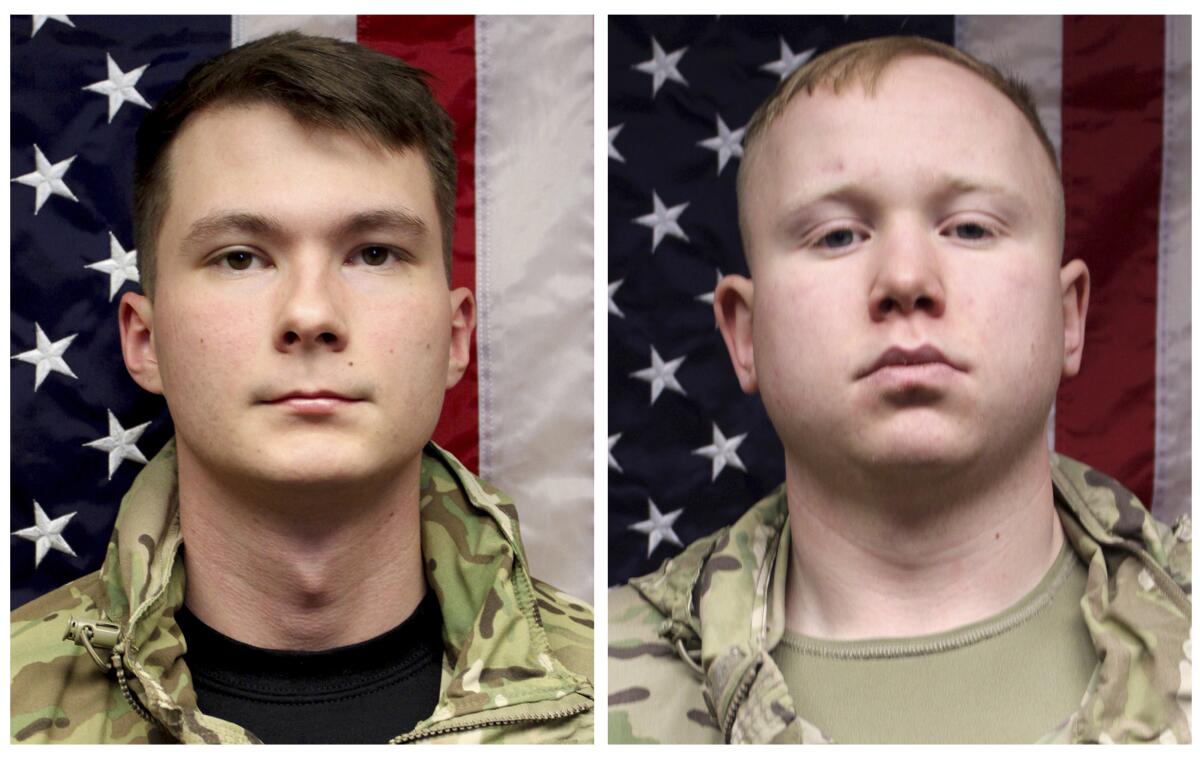 Army portraits of Spcs. Jeremy Daniel Evans and Brian Joshua Snowden.