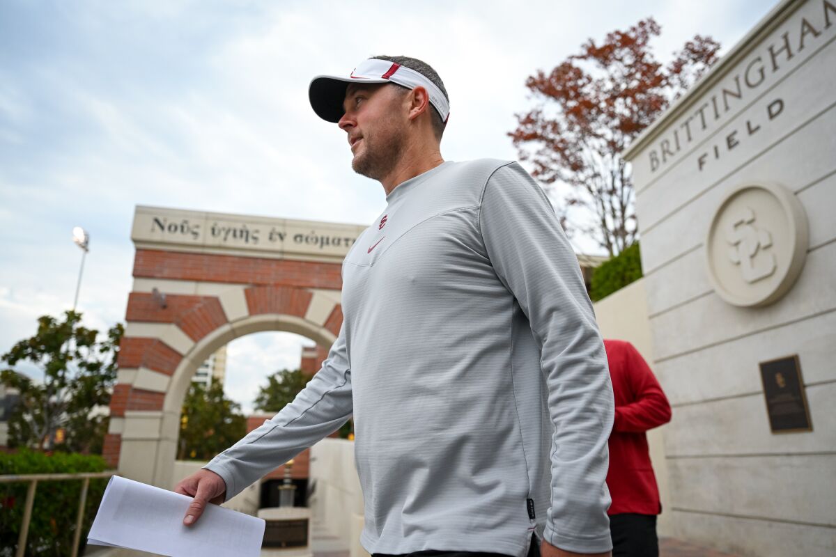 USC head coach Lincoln Riley walks to the practice field.