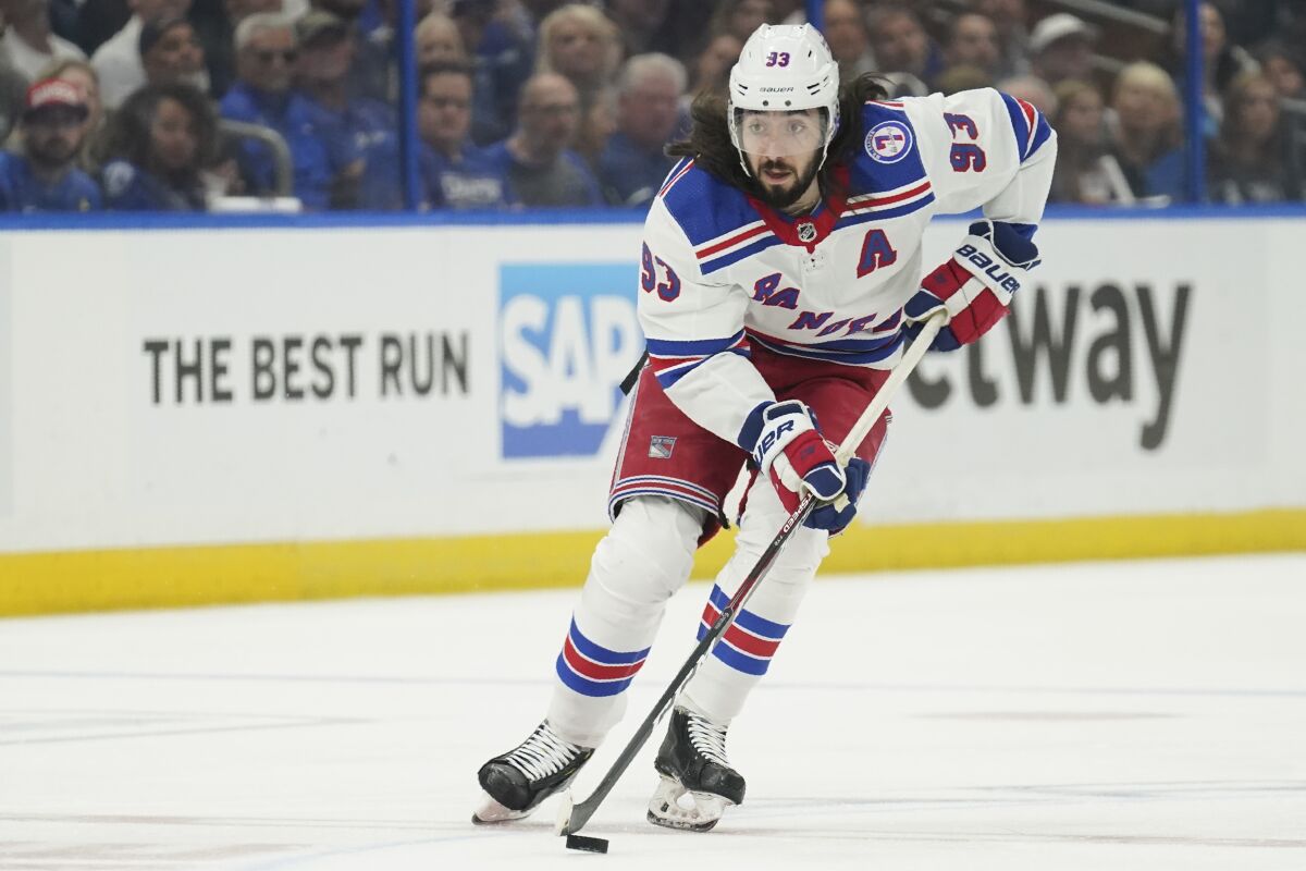 New York Rangers center Mika Zibanejad (93) moves up ice against the Tampa Bay Lightning during the first period in Game 6 of the NHL hockey Stanley Cup playoffs Eastern Conference finals, Saturday, June 11, 2022, in Tampa, Fla. (Chris O'Meara)