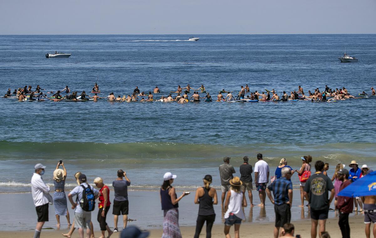Family and friends of former USC lineman Max Tuerk celebrated his life on Saturday at Salt Creek Beach in Dana Point.