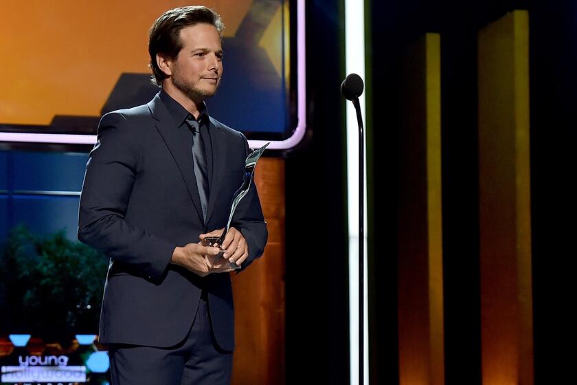 Scott Wolf speaks onstage at the 2014 Young Hollywood Awards.