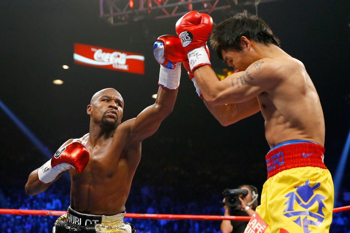 Floyd Mayweather Jr. throws a punch in the first round.