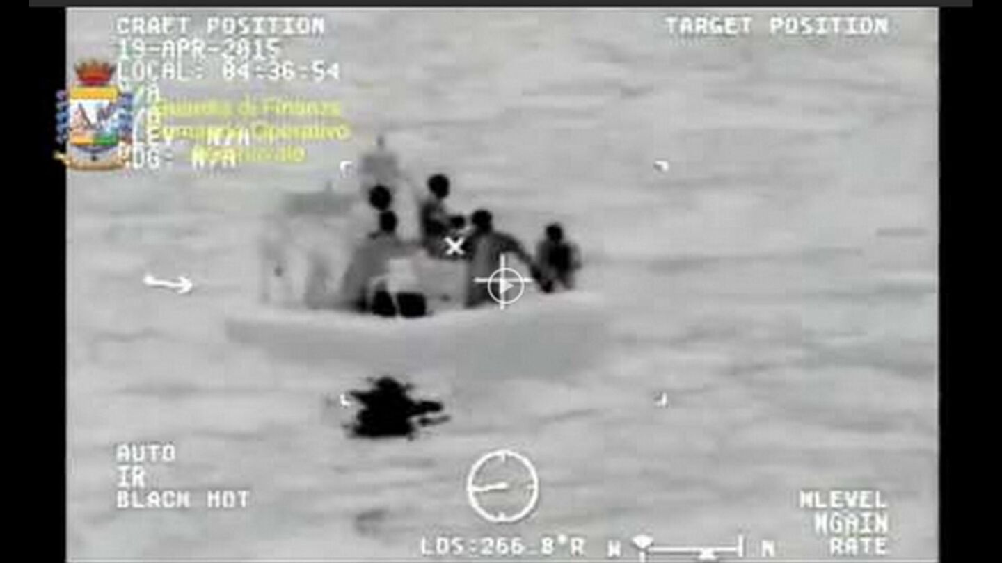 A picture provided by Guardia di Finanza shows an infrared camera screen shot during an operation to rescue migrants after their ship capsized in the Strait of Sicily on Sunday.