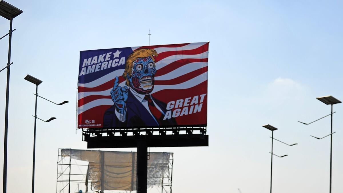 A billboard by U.S. artist Mitch O'Connell depicting President Trump is displayed in Naucalpan de Juarez, in the state of Mexico.