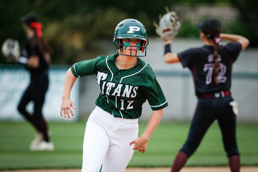 Poway, CA - June 01: Poway's Alyssa Menges (12) rounds second base to eventually score against Torrance during the CIF-Southern California regionals at the school on Thursday, June 1, 2023 in Poway, CA.(Meg McLaughlin / The San Diego Union-Tribune)