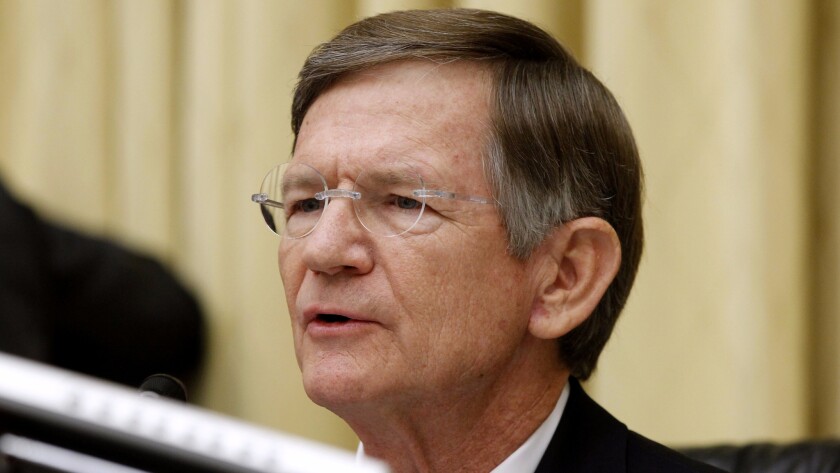 House Rep. Lamar Smith, R-Texas, speaks on Capitol Hill in 2012. Smith issued subpoenas last month to two Democratic state attorneys general, seeking records about their investigation into whether Exxon Mobil misled investors about global warming.