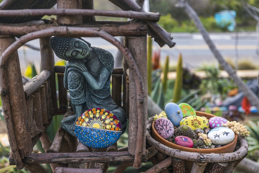 A Hindu sculpture and painted rocks at Dave's Rock Garden in Encinitas on Saturday, January 8.
