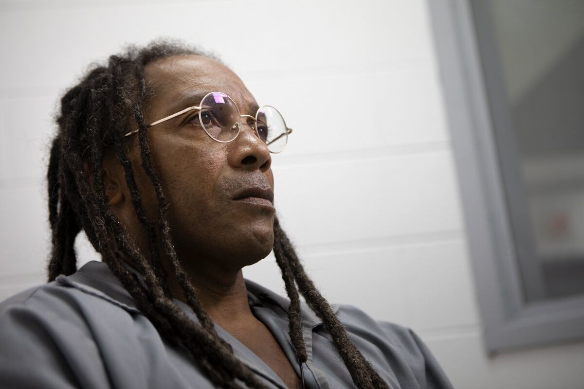 FILE - Kevin Strickland is pictured in an interview room at Western Missouri Correctional Center on Nov. 5, 2019, in Cameron, Mo. Attorneys for the Kansas City man who has spent more than 40 years in prison for a triple murder that many people believe he did not commit will get a chance Monday, Nov. 8, 2021, to argue that their client should be exonerated. An evidentiary hearing in Strickland's case comes after months of delays caused by legal procedures and canceled hearings prompted mostly by motions filed by attorneys in Missouri Attorney General Eric Schmitt's office. (James Wooldridge/The Kansas City Star via AP, File)