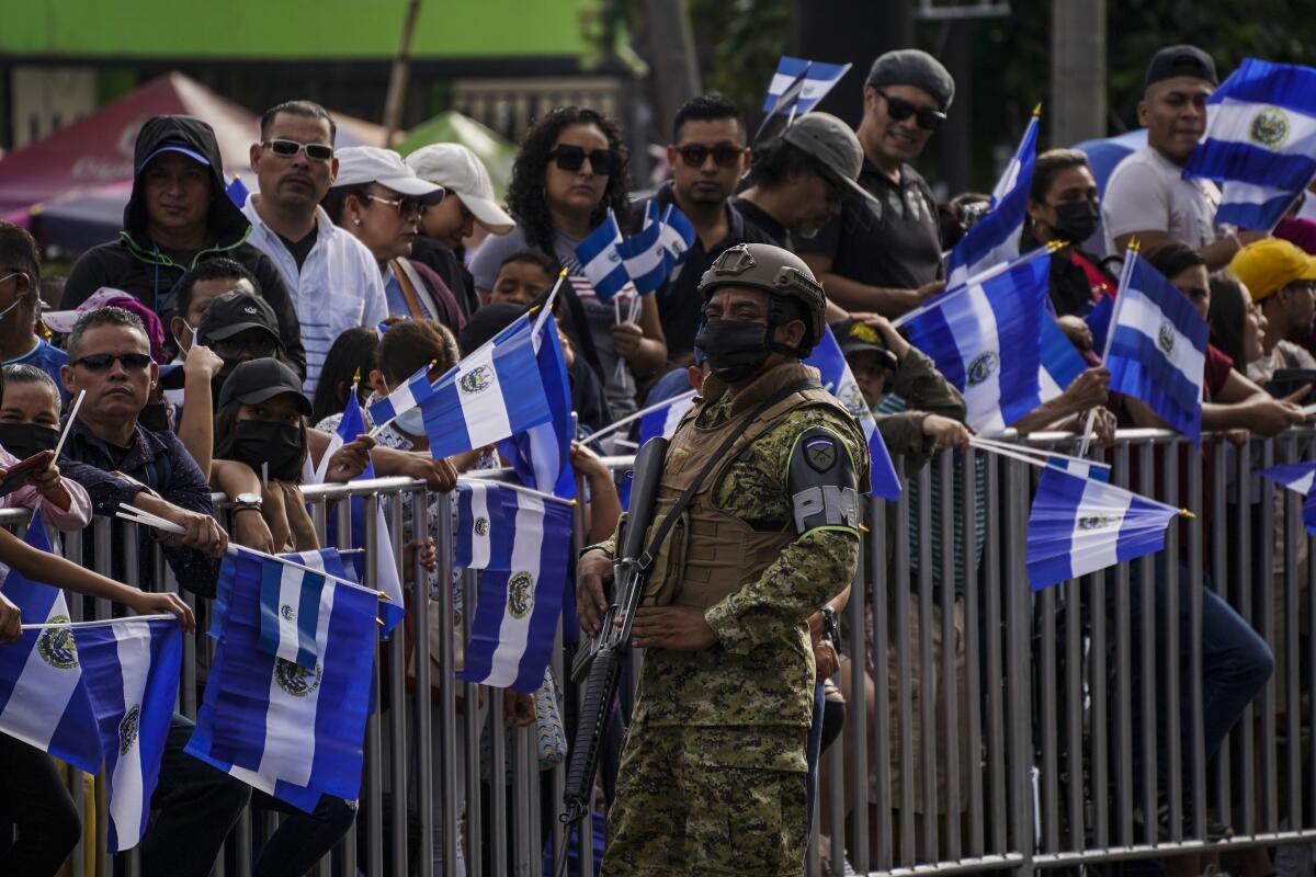  A soldier looks on during a military parade on the commemoration of El Salvador's 201st Independence Day.