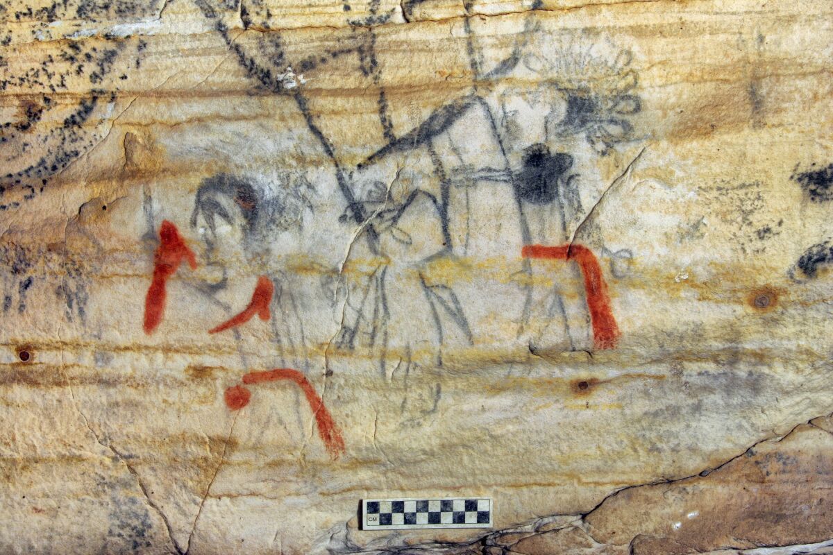 This undated photo provided by Alan Cressler shows a Missouri cave featuring artwork from the Osage Nation dating more than 1,000 years was sold at auction on Tuesday, Sept. 14, 2021. The art inside "Picture Cave" shows humans, animals and mythical creatures. Experts who have studied the cave were concerned about the auction, but the director of the auction company said protections are in place to prohibit the new buyer from exploiting the cave, including a Missouri law that makes doing so a crime. (Alan Cressler via AP)