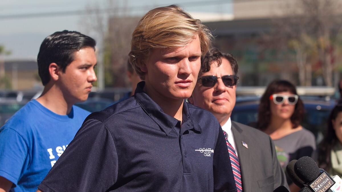 Suspended student Caleb O'Neil appears during a news conference at Orange Coast College.